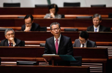 Hong Kong Apartment Developers Hoarding Flats Must Stop Vows Paul Chan
